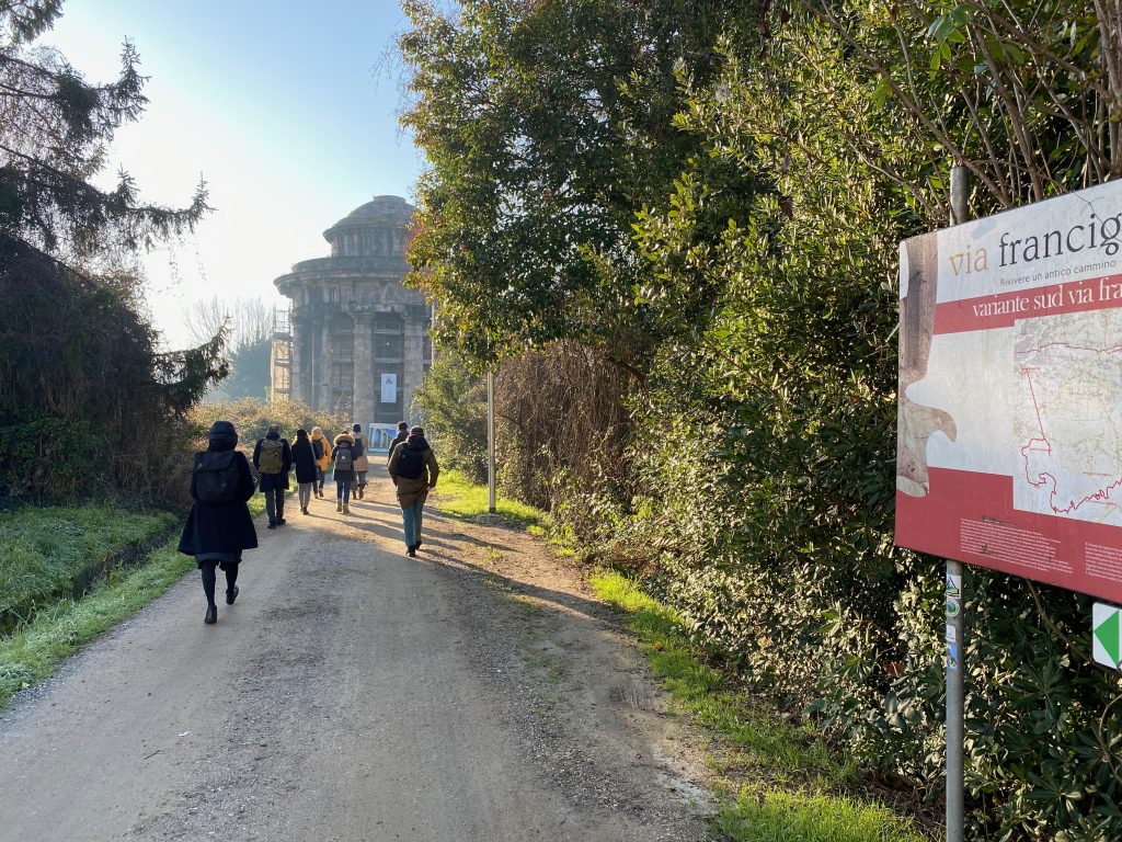 Walking to the monumental Acquedotto Nottolini, sign indicates this part of the via Francigena itinerary.